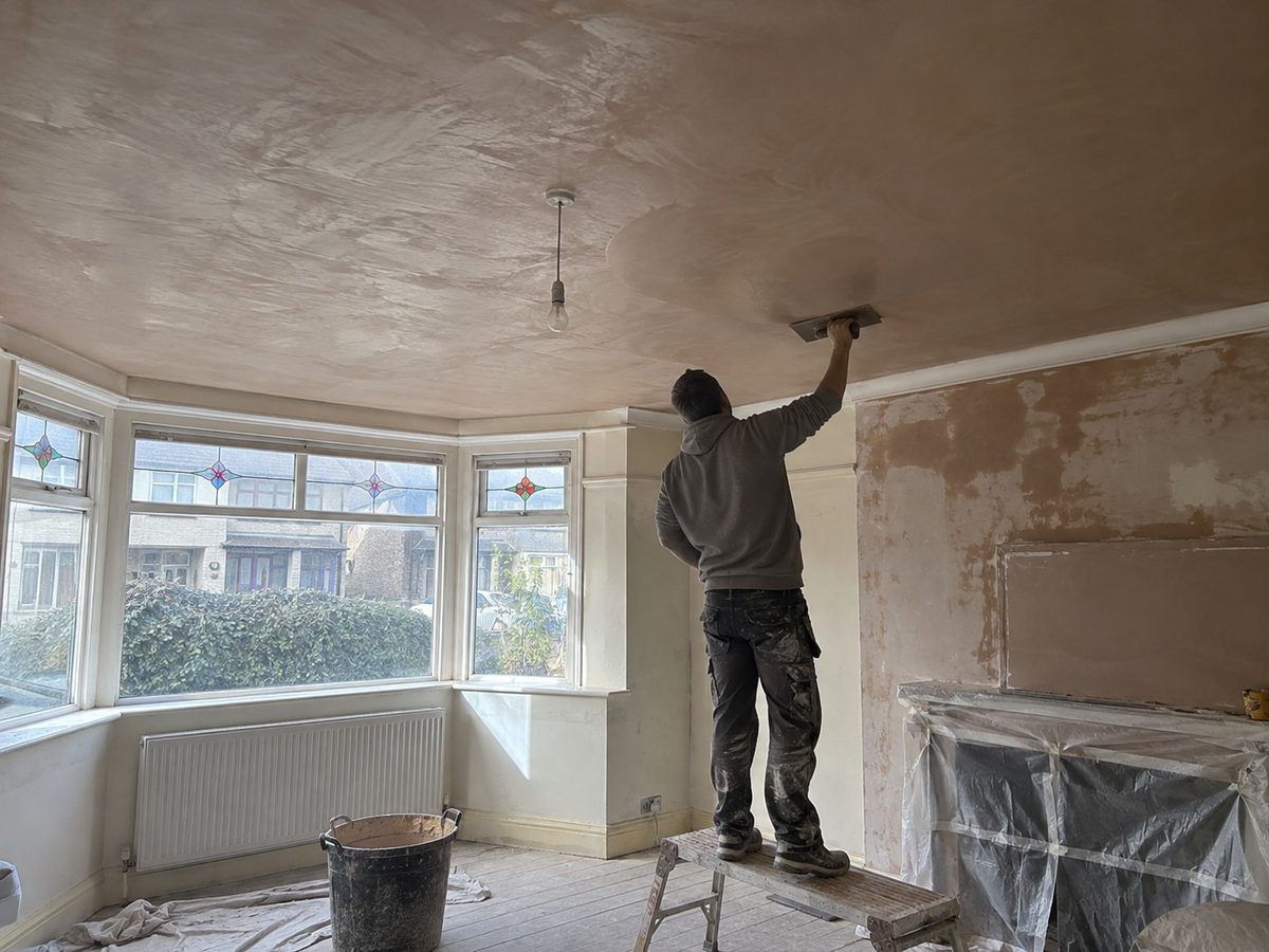A boarded ceiling with the joints taped, before skimming