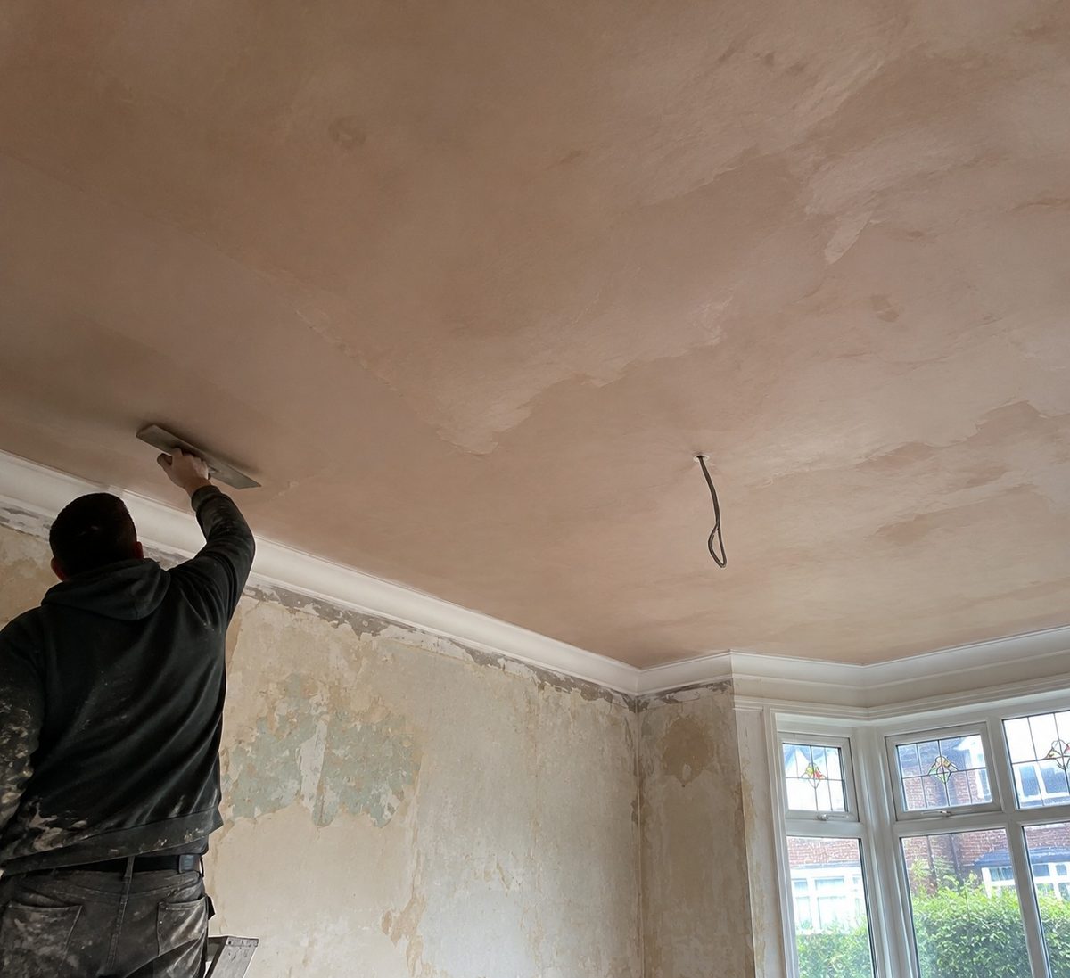 A ceiling in an interwar semi being worked on