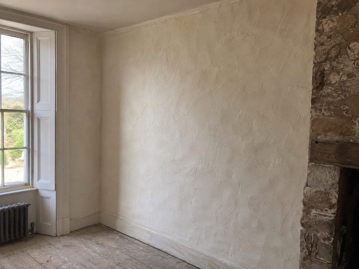 A stone built property with lime plaster inside