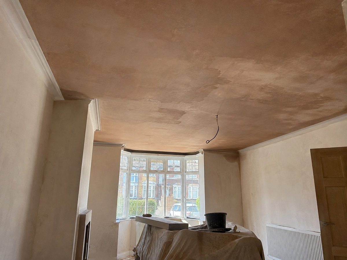 A ceiling being skimmed from a hop up