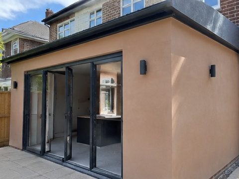 Render being floated onto an external wall