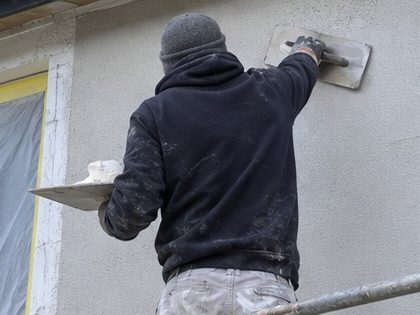 The top coat being applied over the base